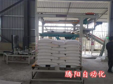 砂浆整条生产线只需要一个包装工码垛工作交给高位码垛机